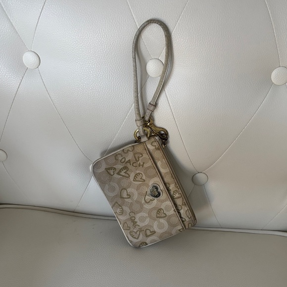 Coach Handbags - Coach Waverly Hearts Beige Heart Pattern Wristlet ( PREOWNED)